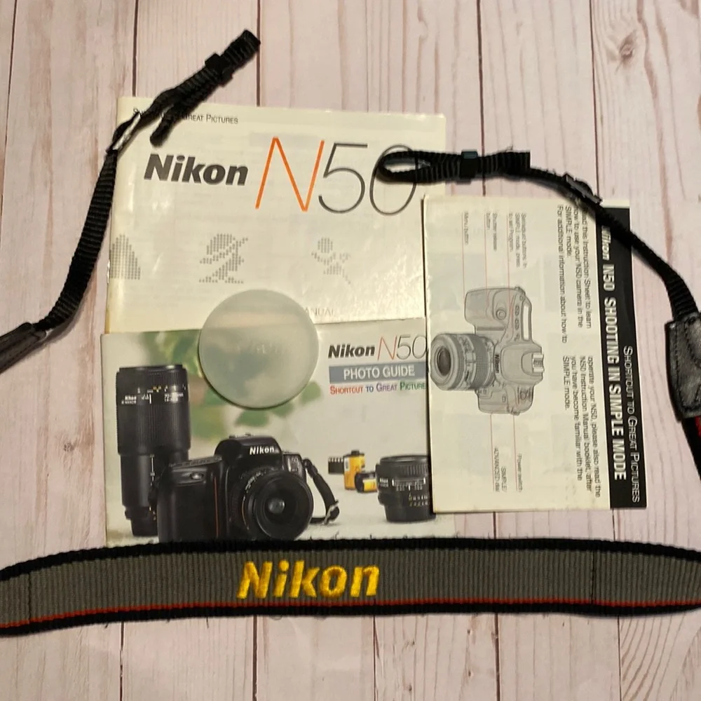 Vintage retro Nikon camera N50 strap and lens cover 1994 accessories